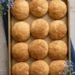 Golden-brown German Snickerdoodles on baking tray with cinnamon-sugar coating