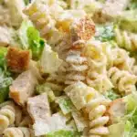 Simple Chicken Caesar Pasta Salad with creamy dressing, lettuce, chicken, and Parmesan