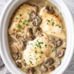 Simple Crockpot Chicken Marsala with mushrooms and creamy wine sauce in slow cooker