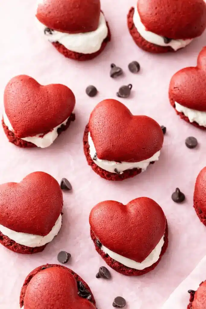 Heart-shaped red velvet whoopie pies with cream cheese filling