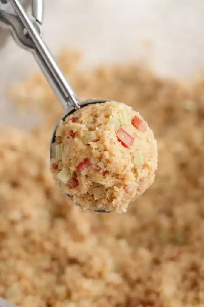 Brown Sugar Rhubarb Cookies Amazing Sweet Treat 8 Brown Sugar Rhubarb Cookies dough in cookie scoop with rhubarb pieces
