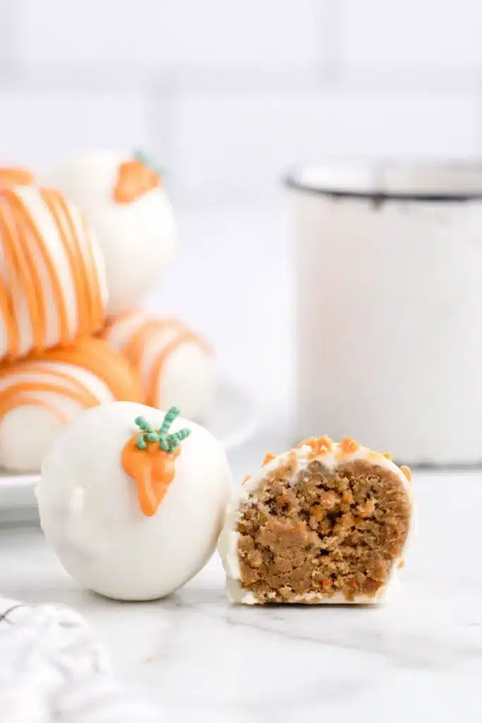 Carrot Cake Cheesecake Bites with white chocolate coating and moist carrot cake filling