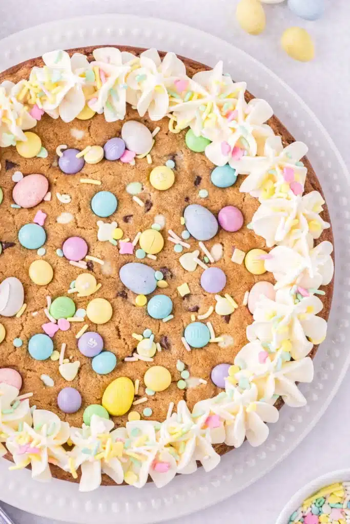 Easter Cookie Cake Recipe Quick Colorful Delight 7 Close-up Easter Cookie Cake with pastel candies and vanilla frosting border