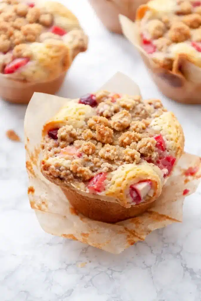 Strawberry Rhubarb Muffins with Buttermilk and Brown Sugar Streusel 4 Strawberry Rhubarb Muffins with crispy streusel topping close up