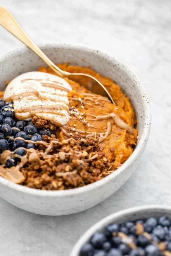 Close-up Sweet Potato Breakfast Bowl with yogurt and granola