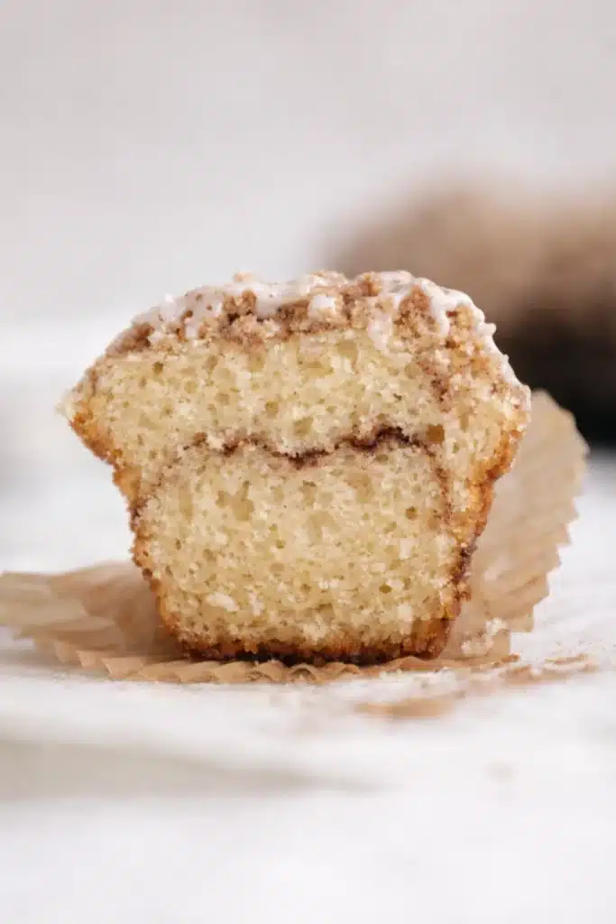 Coffee Cake Muffins Ultimate Cozy Breakfast Treat 5 Halved Coffee Cake Muffins showing soft crumb and cinnamon swirl