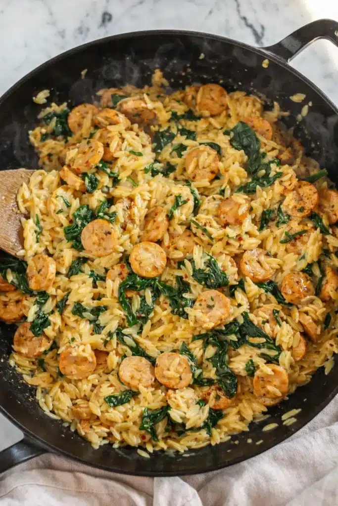 Creamy Chicken Sausage Orzo Easy Comfort Meal 7 Creamy Chicken Sausage Orzo cooking in skillet