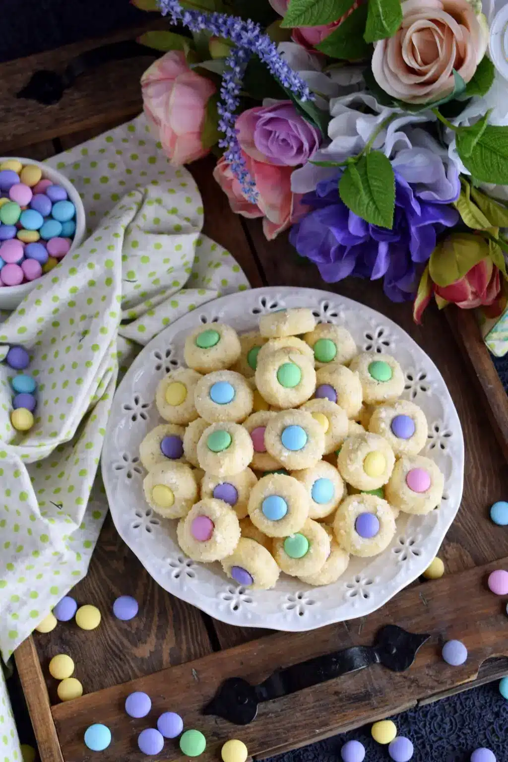 home 10 Easter Bunny Button Cookies with pastel candy centers on white plate