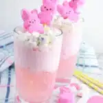 Pink Easter Bunny Punch with marshmallow Peeps and sprinkles in tall glasses