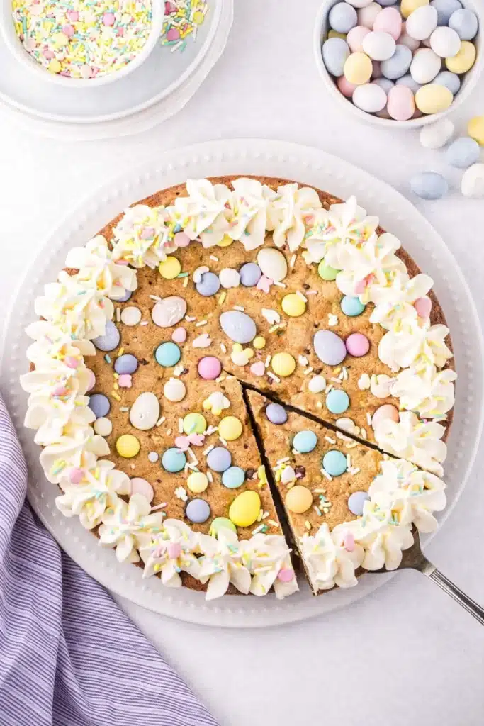 Easter Cookie Cake Recipe Quick Colorful Delight 8 Overhead Easter Cookie Cake with pastel candies and vanilla frosting border