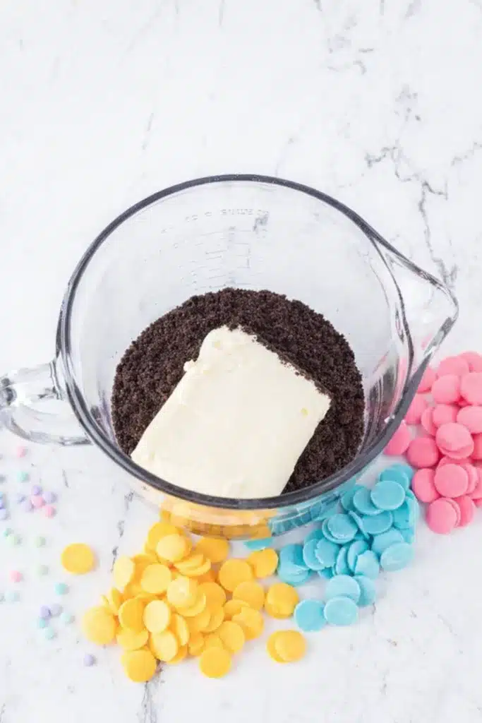  Mixing crushed Oreos and cream cheese for Easter Egg Oreo Balls