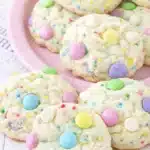 Soft Funfetti Cake Cookies for Easter with pastel candies and white chocolate chips on spring plate