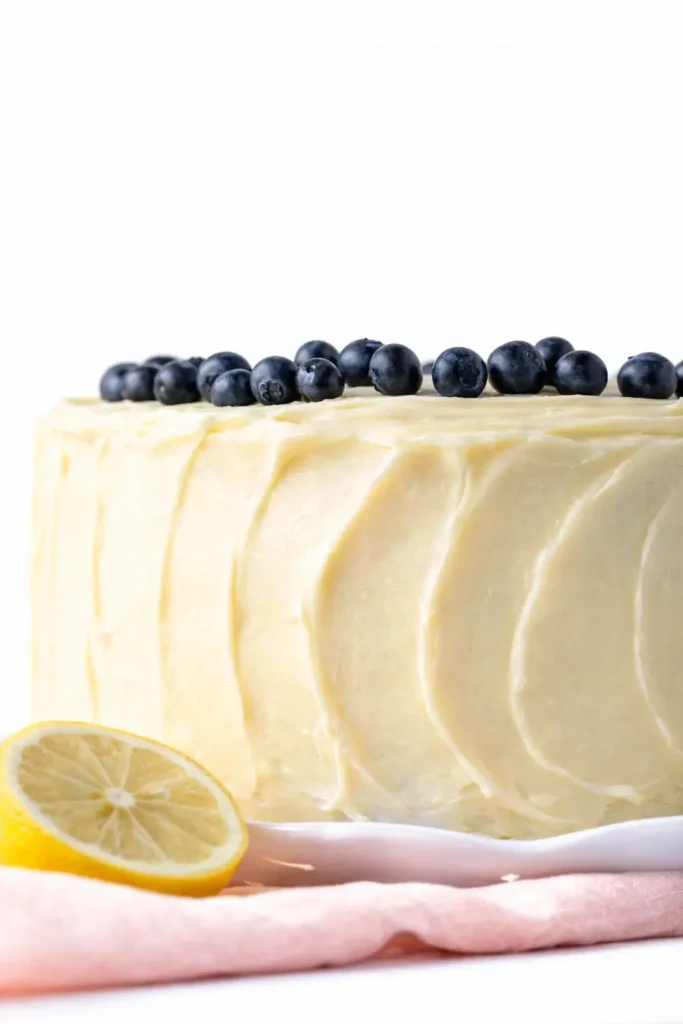 Lemon Blueberry Cake with cream cheese frosting and fresh blueberries on top
