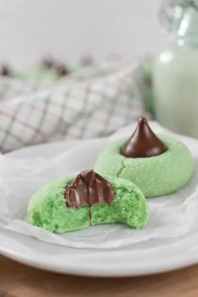 Mint Chocolate Kiss Blossom Cookies showing soft green center and melted chocolate