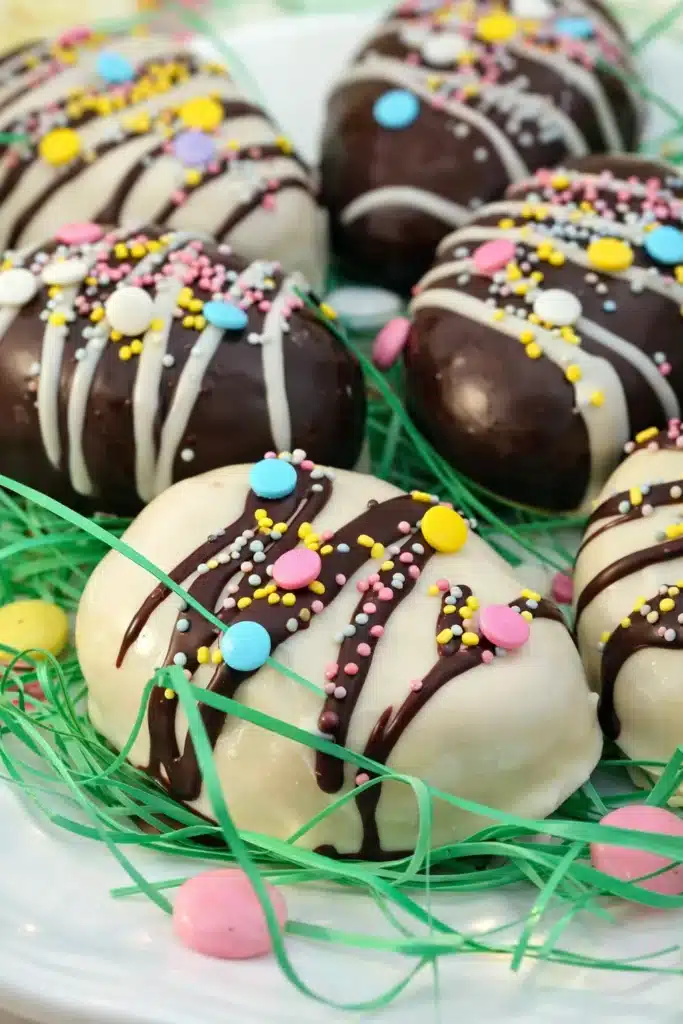 Peanut Butter Cookie Dough Easter Eggs with pastel sprinkles and chocolate drizzle