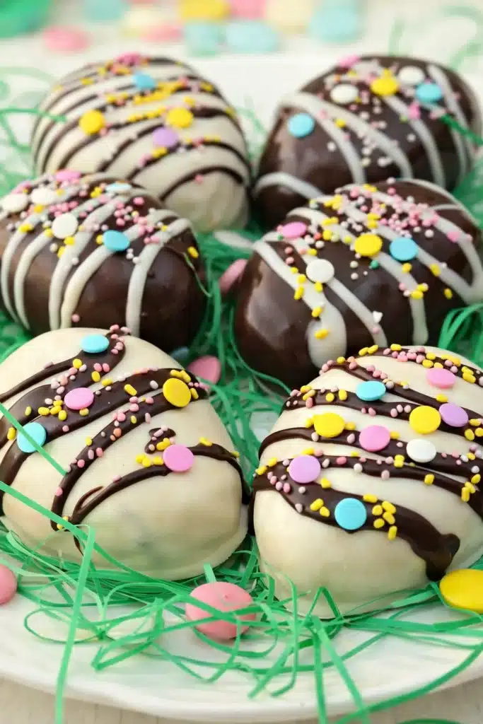 Peanut Butter Cookie Dough Easter Eggs with chocolate drizzle and pastel sprinkles