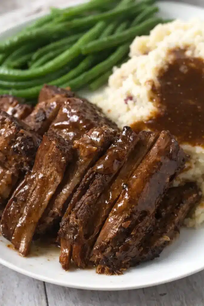 Crock Pot chuck roast with mashed potatoes and green beans