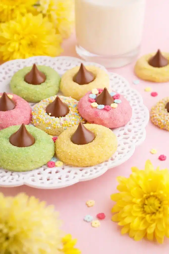 Spring Blossom Cookies Easy Colorful Easter Treat 7 Spring Blossom Cookies on lace plate with milk and yellow flowers