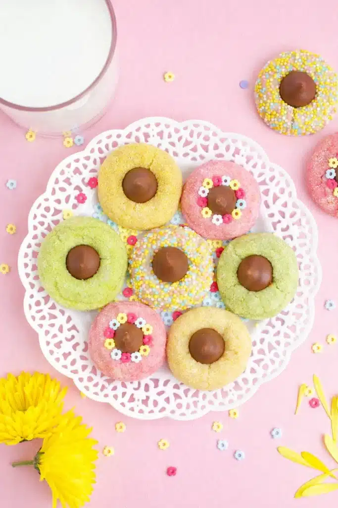 Spring Blossom Cookies Easy Colorful Easter Treat 8 Spring Blossom Cookies on white lace plate with pastel sprinkles
