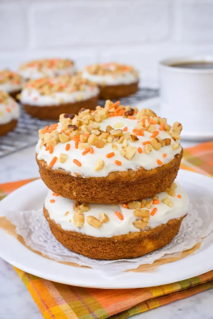 Stacked Carrot Cake Donuts with cream cheese frosting and walnuts
