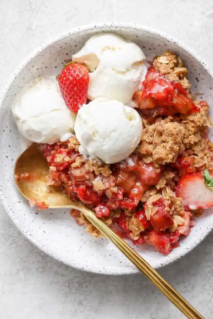 Strawberry Rhubarb Crisp Easy Amazing Recipe 4 Single serving Strawberry Rhubarb Crisp with vanilla ice cream in bowl