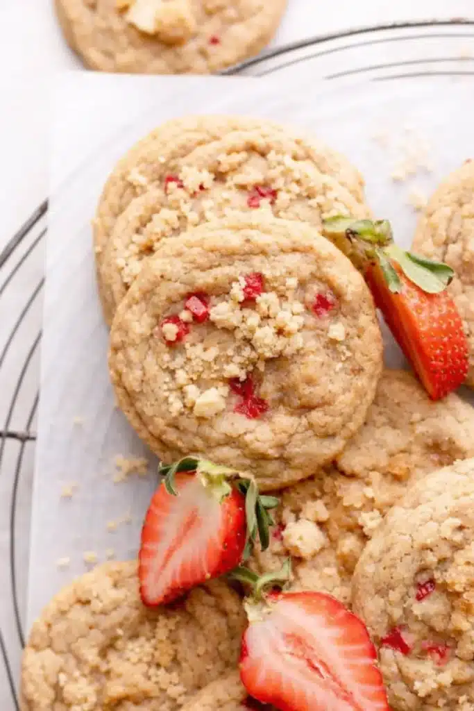 Soft strawberry shortcake cookies with fresh strawberry pieces and buttery crumbs