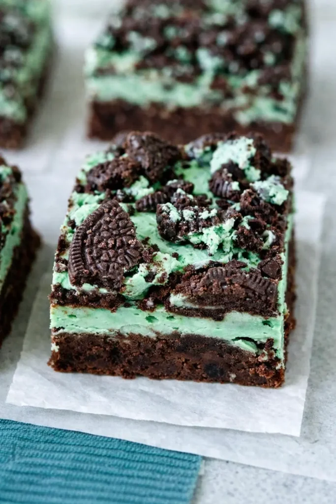 Triple Layer Mint Brownies Amazing Fudgy Treat 8 Triple Layer Mint Brownies with green mint frosting and crushed chocolate cookies