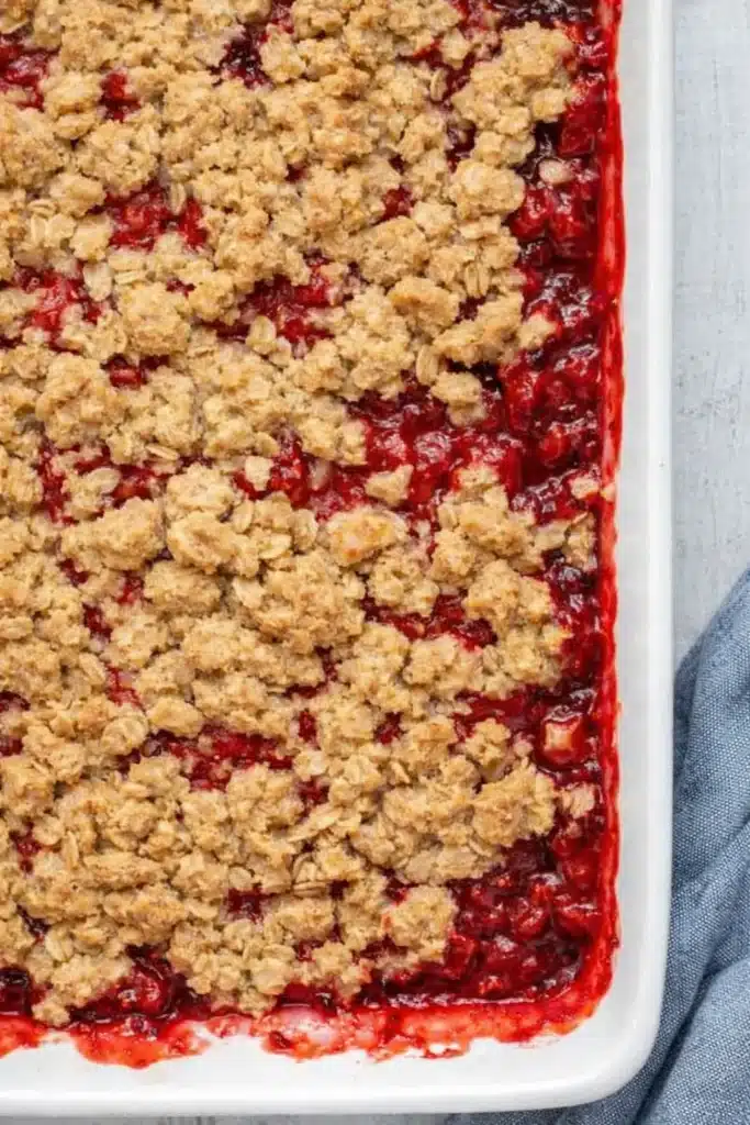 Strawberry crumble baked in a ceramic dish