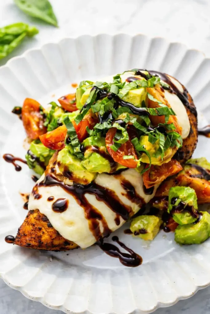 California grilled chicken with mozzarella avocado tomatoes basil and balsamic glaze