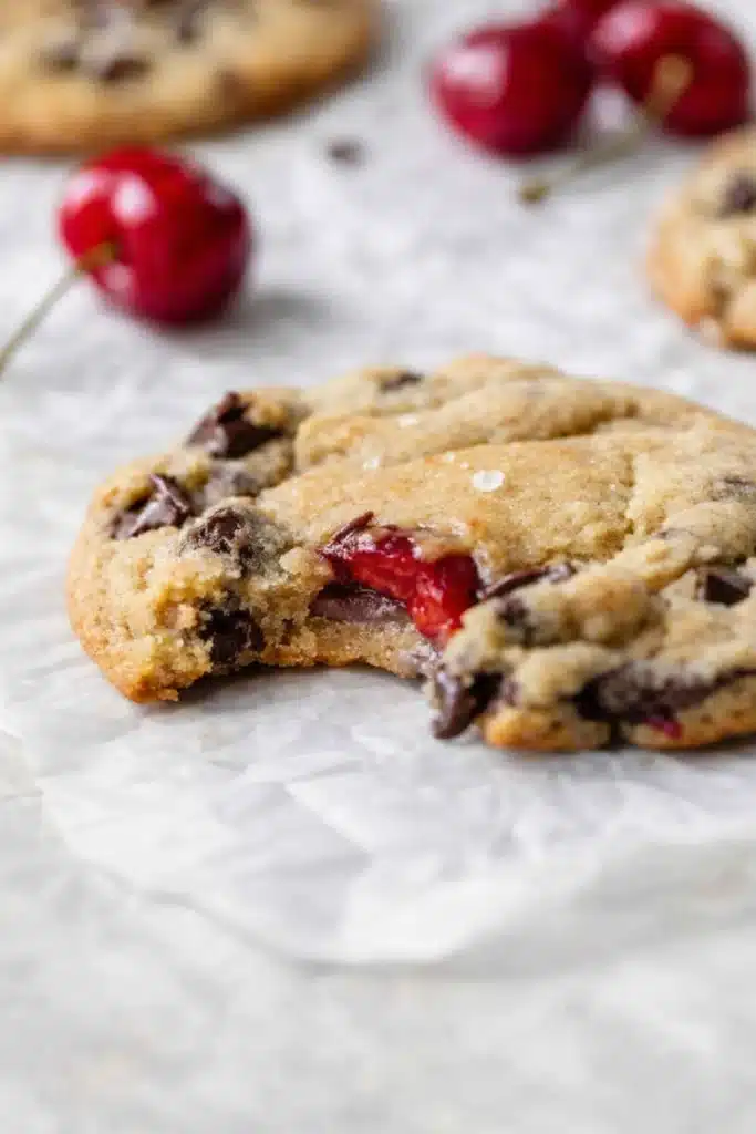 Cherry chocolate chip cookies with gooey chocolate chips and cherry filling