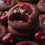 Chocolate cherry cookies with glossy ganache center and fresh cherries