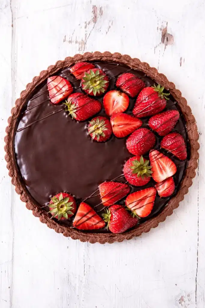 Whole Dark Chocolate Strawberry Tart with glossy ganache and fresh strawberries