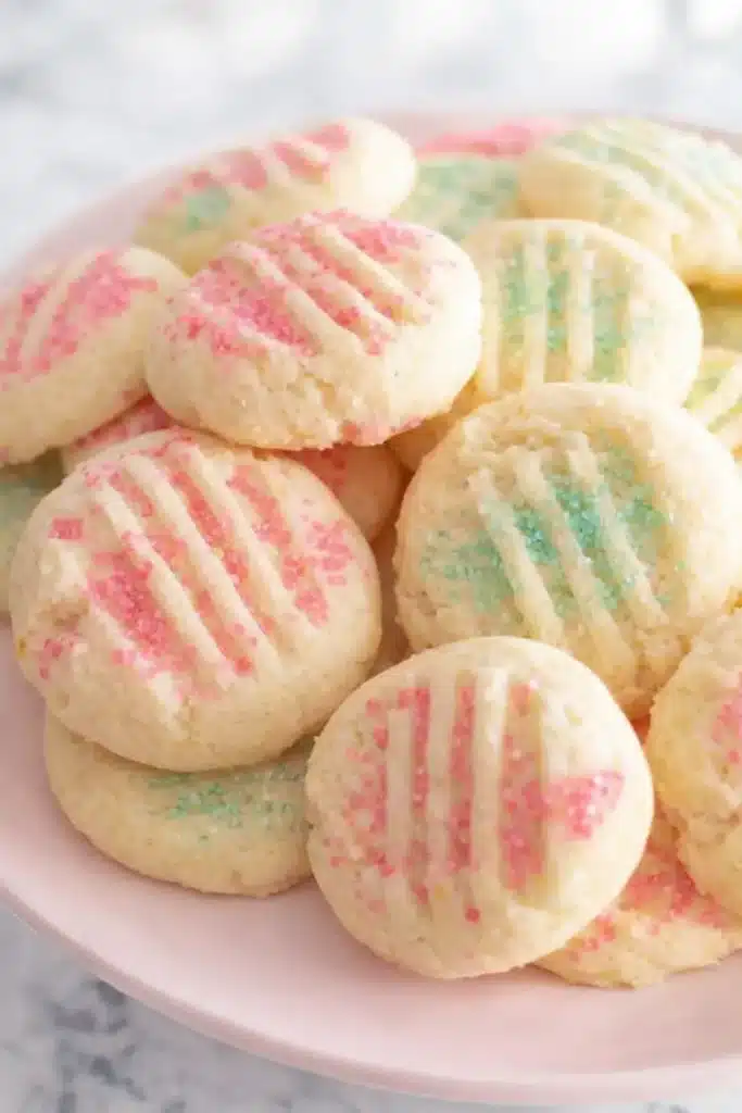 Easter Shortbread Cookies Easy Amazing Spring Recipe 5 Easter shortbread cookies with pastel sugar sprinkles on a plate
