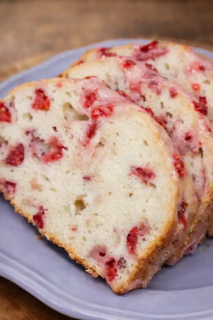 Easy Strawberry Bread Simple Amazing Fresh Treat 6 Easy strawberry bread slices with glaze and fresh strawberry pieces