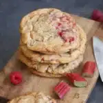 Rhubarb Raspberry Cookies Recipe That Feels Amazing 9 Stack of rhubarb raspberry cookies with fresh raspberries and rhubarb on a rustic surface