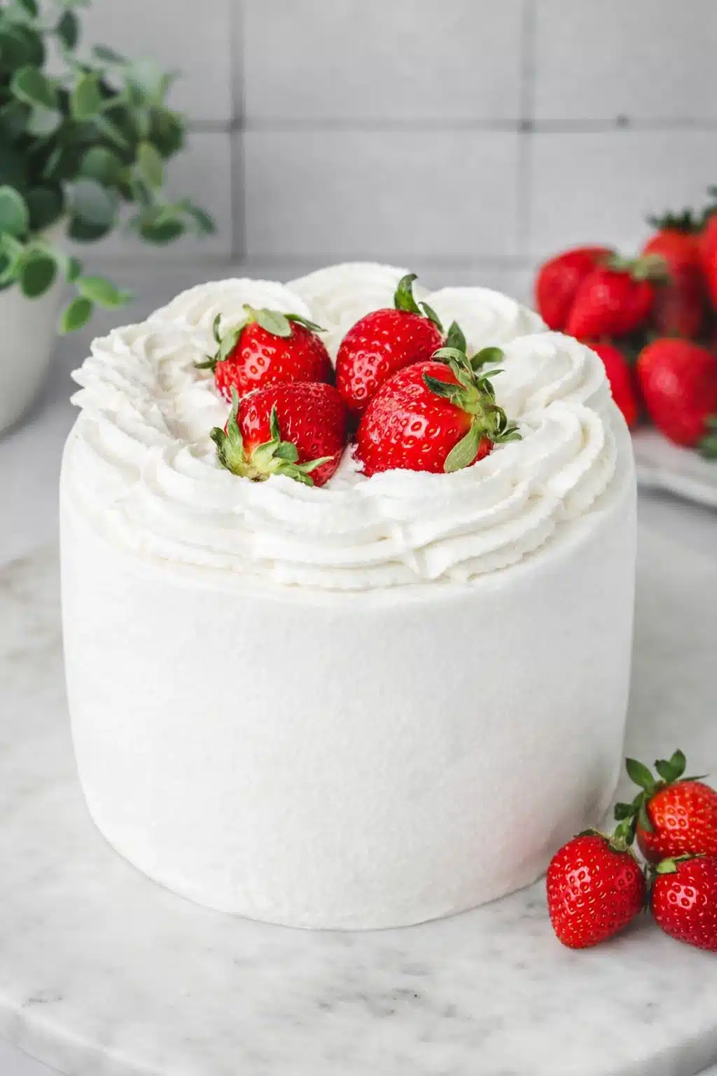 home 6 Strawberry cream cake with whipped cream frosting and fresh strawberries on top