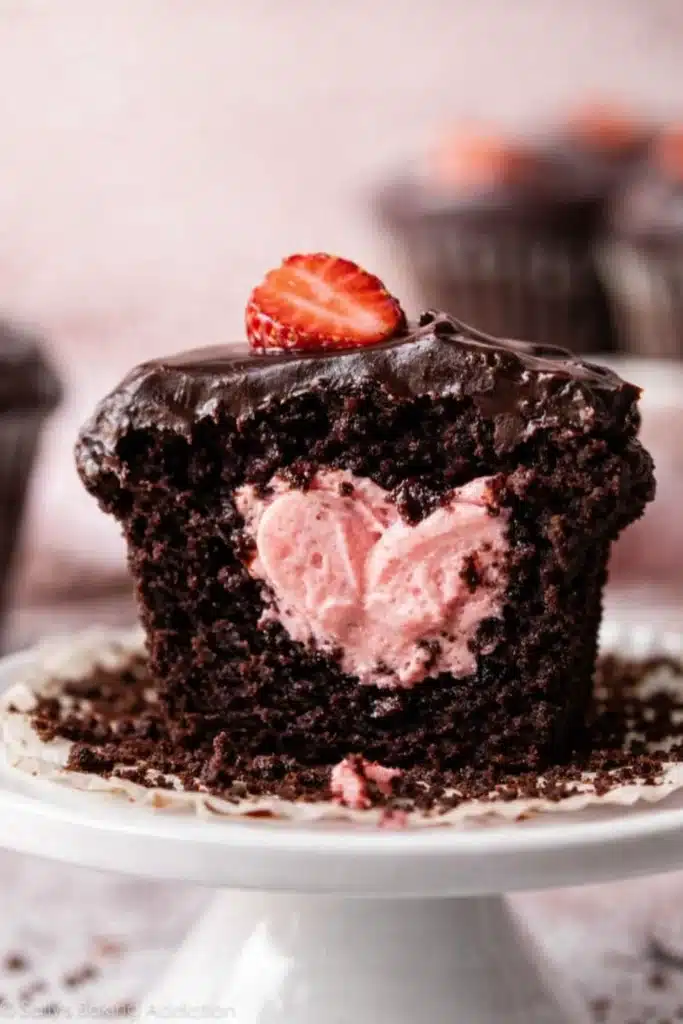Strawberry Cupcakes That Feel Absolutely Amazing 4 Strawberry Cupcakes with chocolate ganache and heart shaped strawberry filling