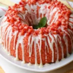 Strawberry pound cake with white glaze and fresh strawberry topping