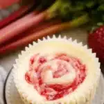 Strawberry rhubarb mini cheesecake with creamy filling and fruit swirl