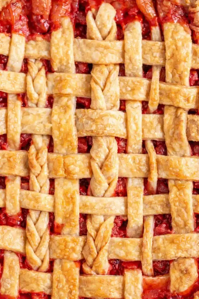 Strawberry Rhubarb Pie Recipe That Feels Amazing 6 Strawberry Rhubarb Pie Recipe with golden lattice crust close up