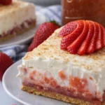 Strawberry Rhubarb Pudding Dessert | Easy Summer Favorite 7 Strawberry rhubarb pudding dessert slice with creamy layers and graham crust
