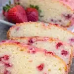 Easy Strawberry Pound Cake Recipe That Tastes Amazing 7 Easy strawberry pound cake slices with pink glaze and fresh strawberries