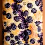 Lemon Blueberry Bread Recipe | Amazing Easy Loaf 7 Close-up of lemon blueberry bread with juicy baked blueberries and golden moist loaf