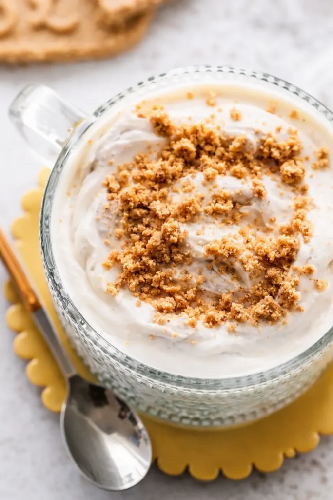 2 ingredient yogurt cheesecake with creamy yogurt and biscuit crumbs in glass cup