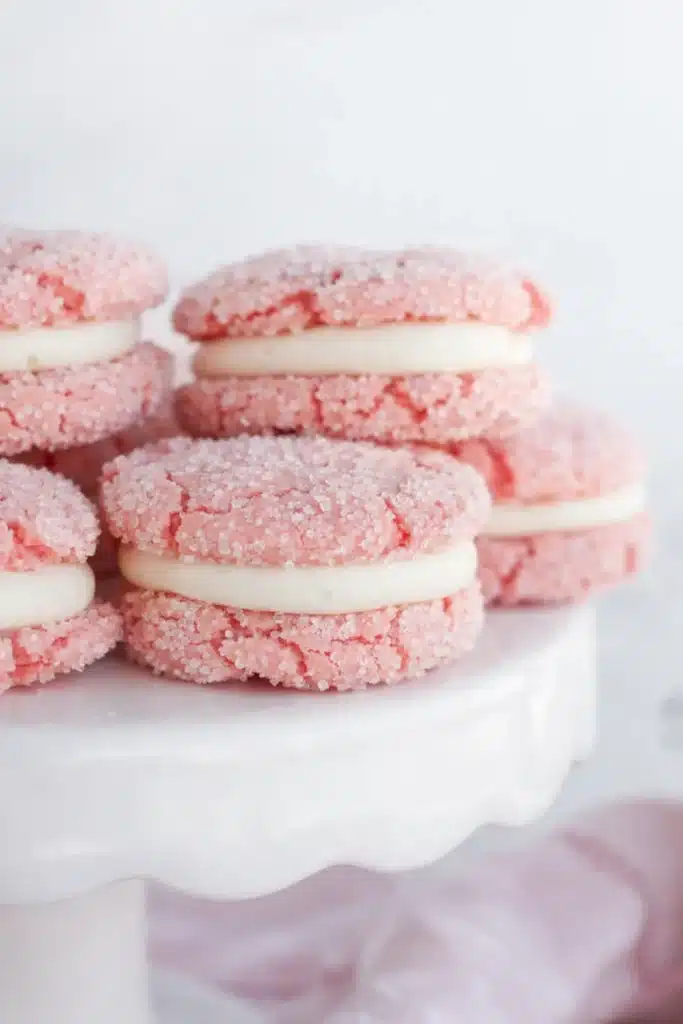 Strawberry Cake Mix Sandwich Cookies with creamy filling close up