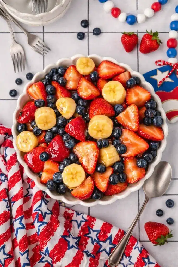 4th of July fruit salad with strawberries blueberries and bananas in a bowl