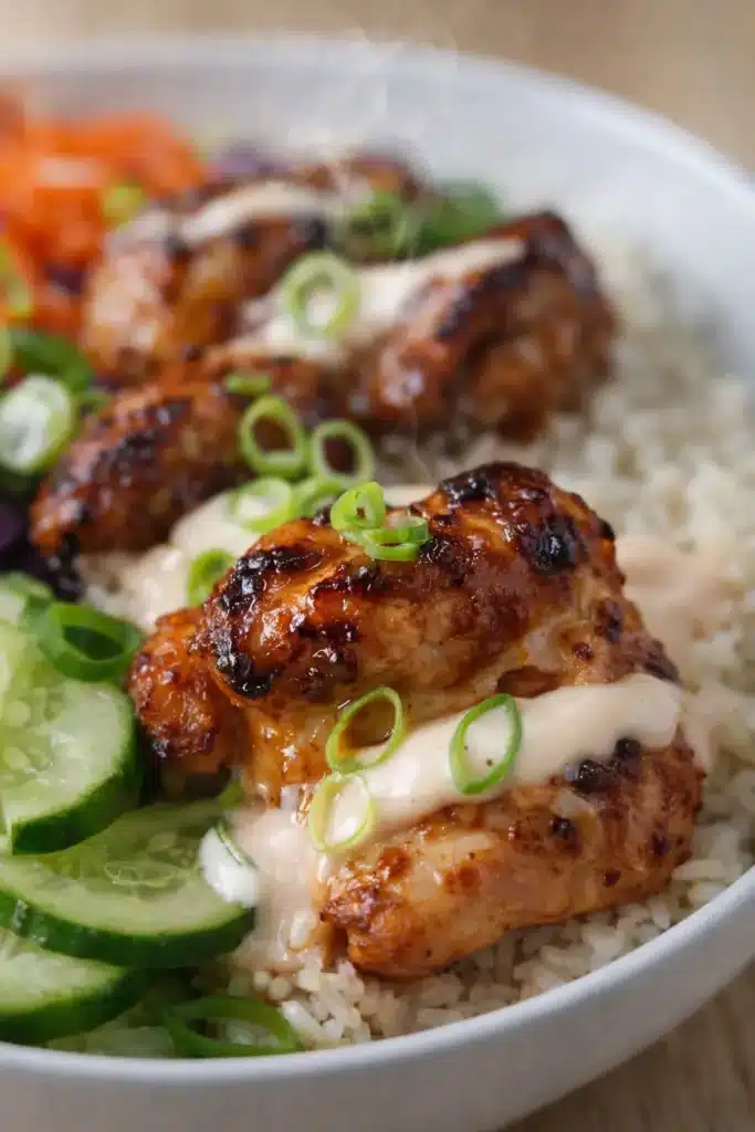 Bang Bang Chicken Easy Amazing Dinner Recipe 4 Bang Bang Chicken close-up with creamy sauce over rice and fresh vegetables