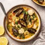 Bouillabaisse recipe with shrimp, mussels, and saffron broth served with toasted bread