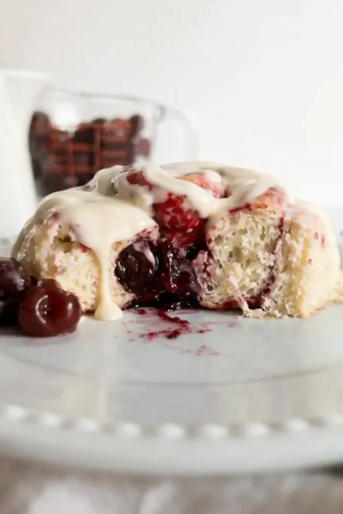 Cherry cinnamon rolls with cream cheese frosting and gooey cherry filling