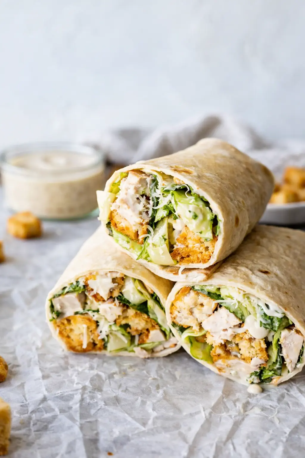 Chicken Caesar wrap with crispy chicken, romaine lettuce, and creamy dressing